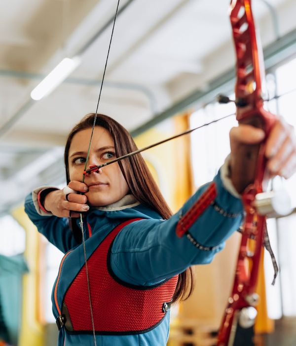 Person practicing eye relaxation techniques in a modern office